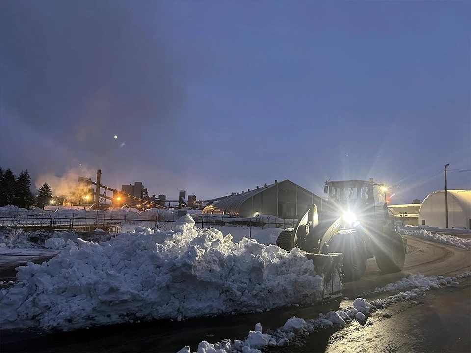 Stellar Contracting snow clearing equipment working near industrial site in Kitimat